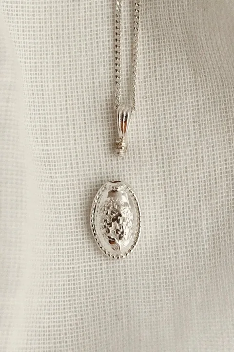 Forget-Me-Not Circle Cremains Urn Necklace - Sterling Silver — product image 5