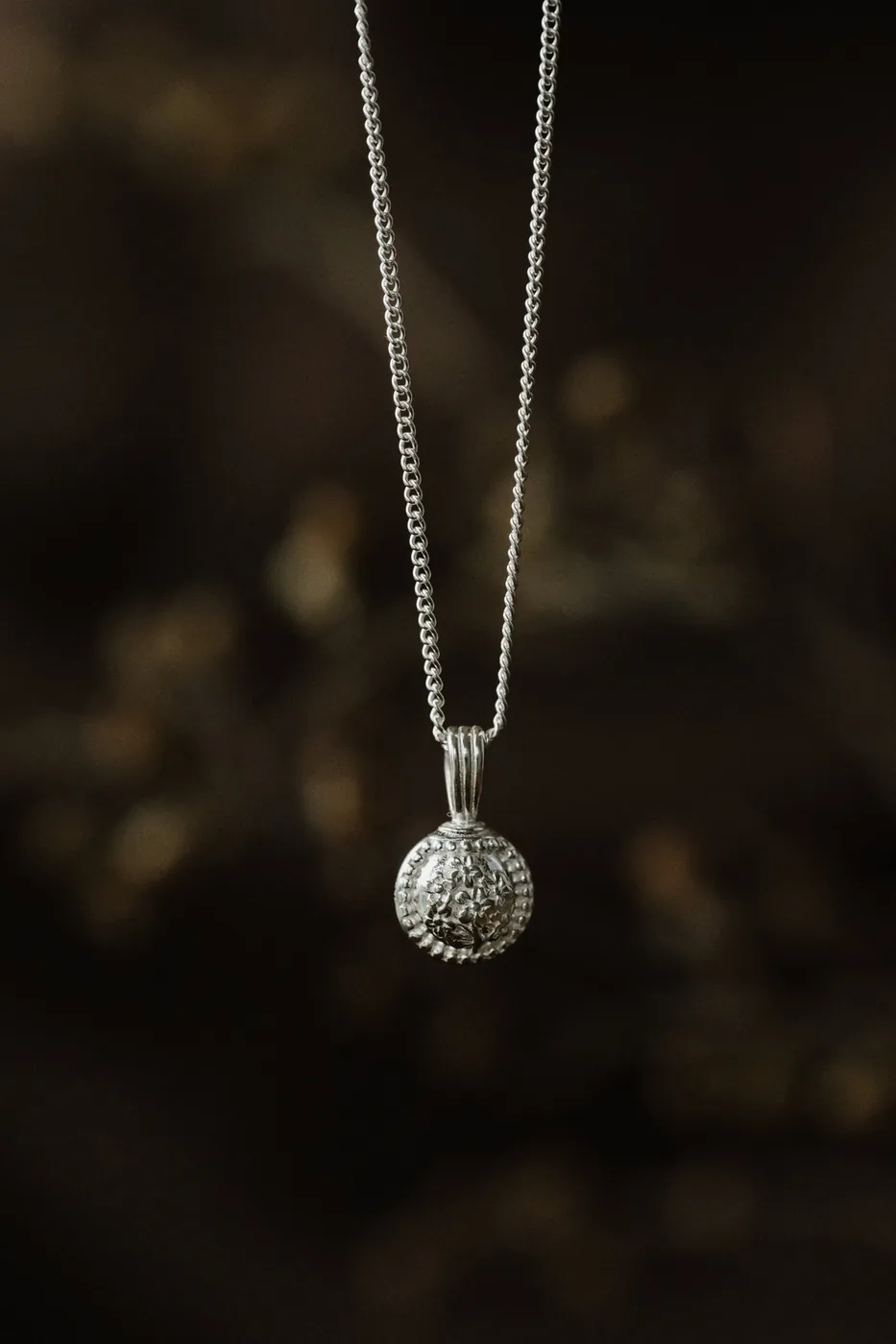 Forget-Me-Not Circle Cremains Urn Necklace - Sterling Silver — product image 1
