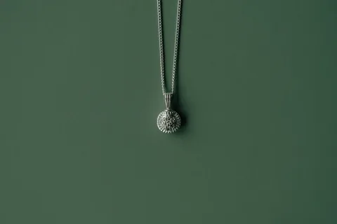 Forget-Me-Not Circle Cremains Urn Necklace - Sterling Silver — product image 4